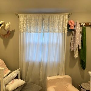 White curtains. Like new. Smoke free/ pet free home